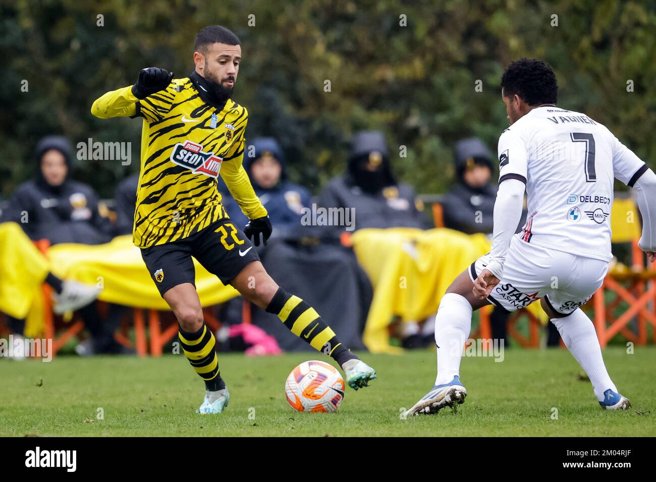 BURGH-HAAMSTEDE, NETHERLANDS - DECEMBER 4: Paolo Fernandes of AEK Athens dribbles with the ball during the Friendly match between AEK Athens and RFC Seraing at Sportpark van Zuijen on December 4, 2022 in Burgh-Haamstede, Netherlands (Photo by Broer van den Boom/Orange Pictures) Stock Photo