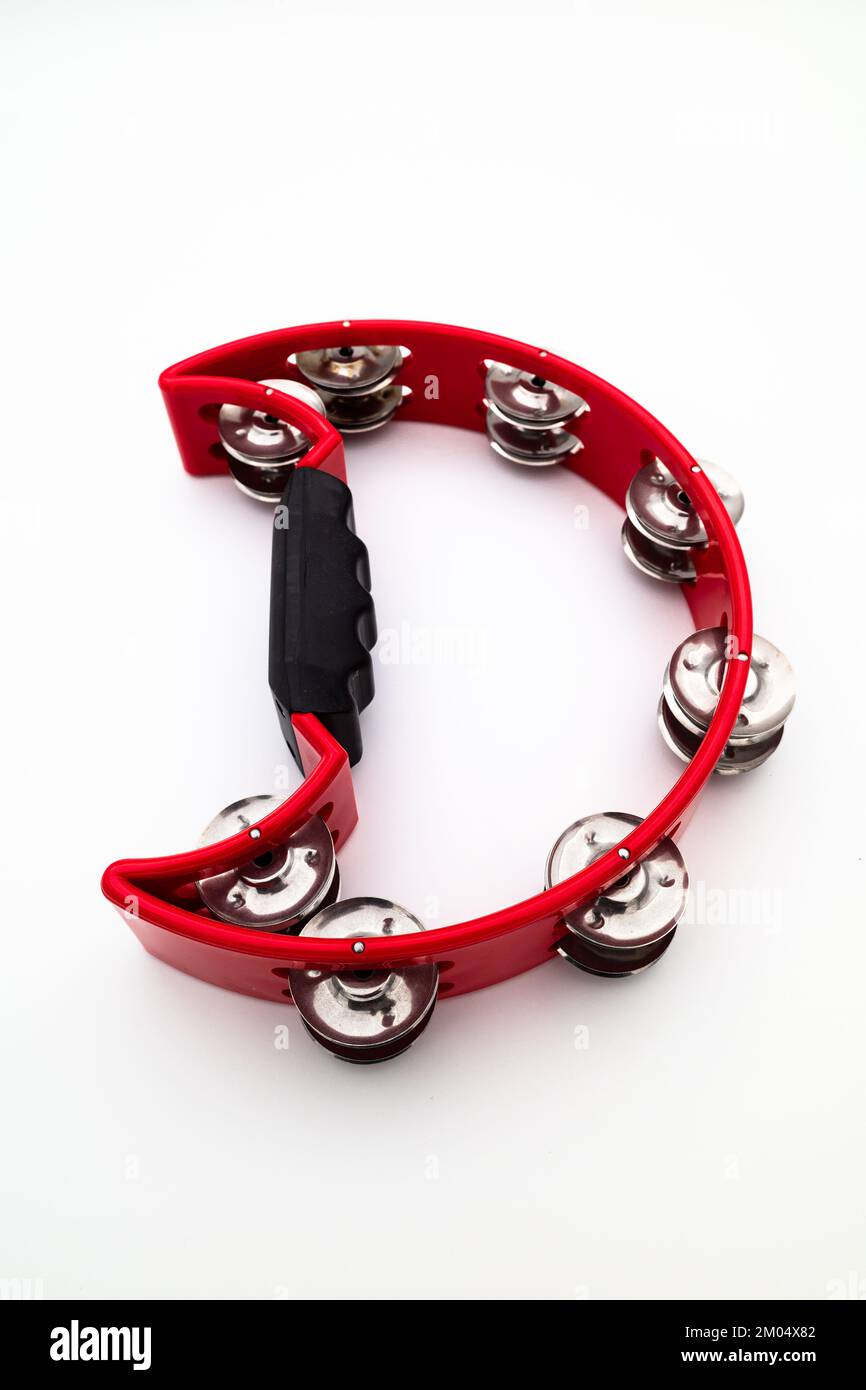 Percussive instrument tambourine, isolated on the white background Stock Photo