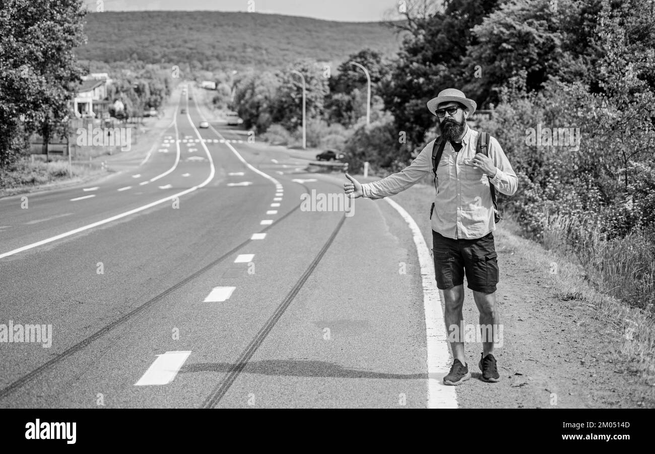 Stop car. Man try stop car thumb up. Hitchhiking one of cheapest ways traveling. Picking up