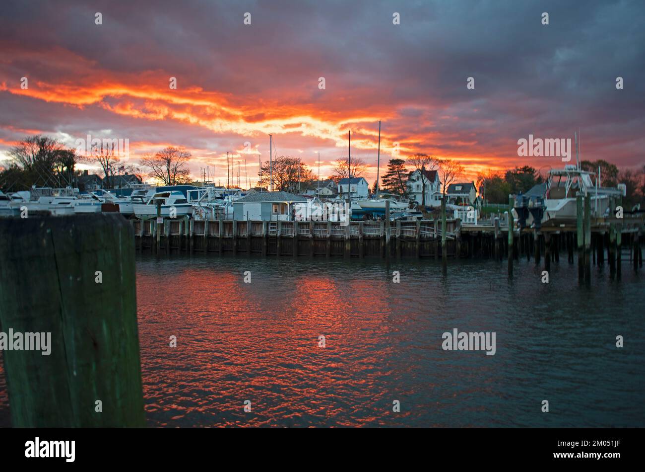 Dramatic sunset at the marina at Keyport, New Jersey, with sun setting
