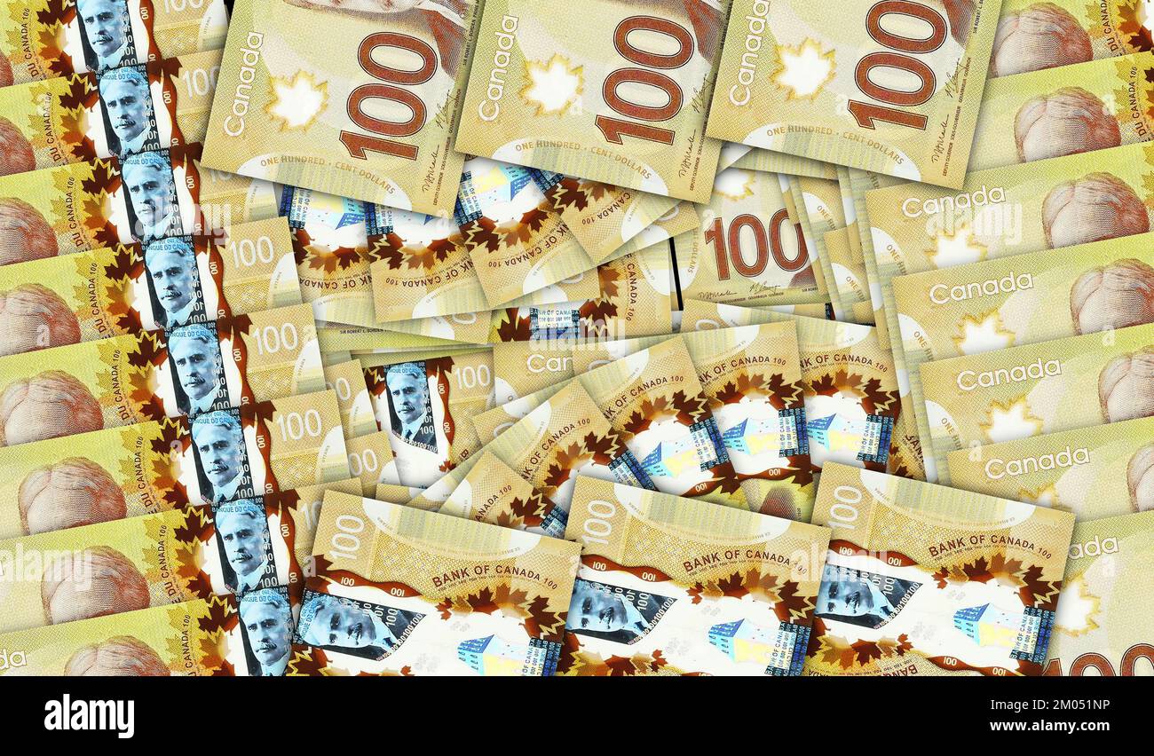 Canada Dollar banknotes in a cash fan mosaic pattern. Canadian 100 CAD notes. Abstract concept of bank, finance, economy decorative design background Stock Photo