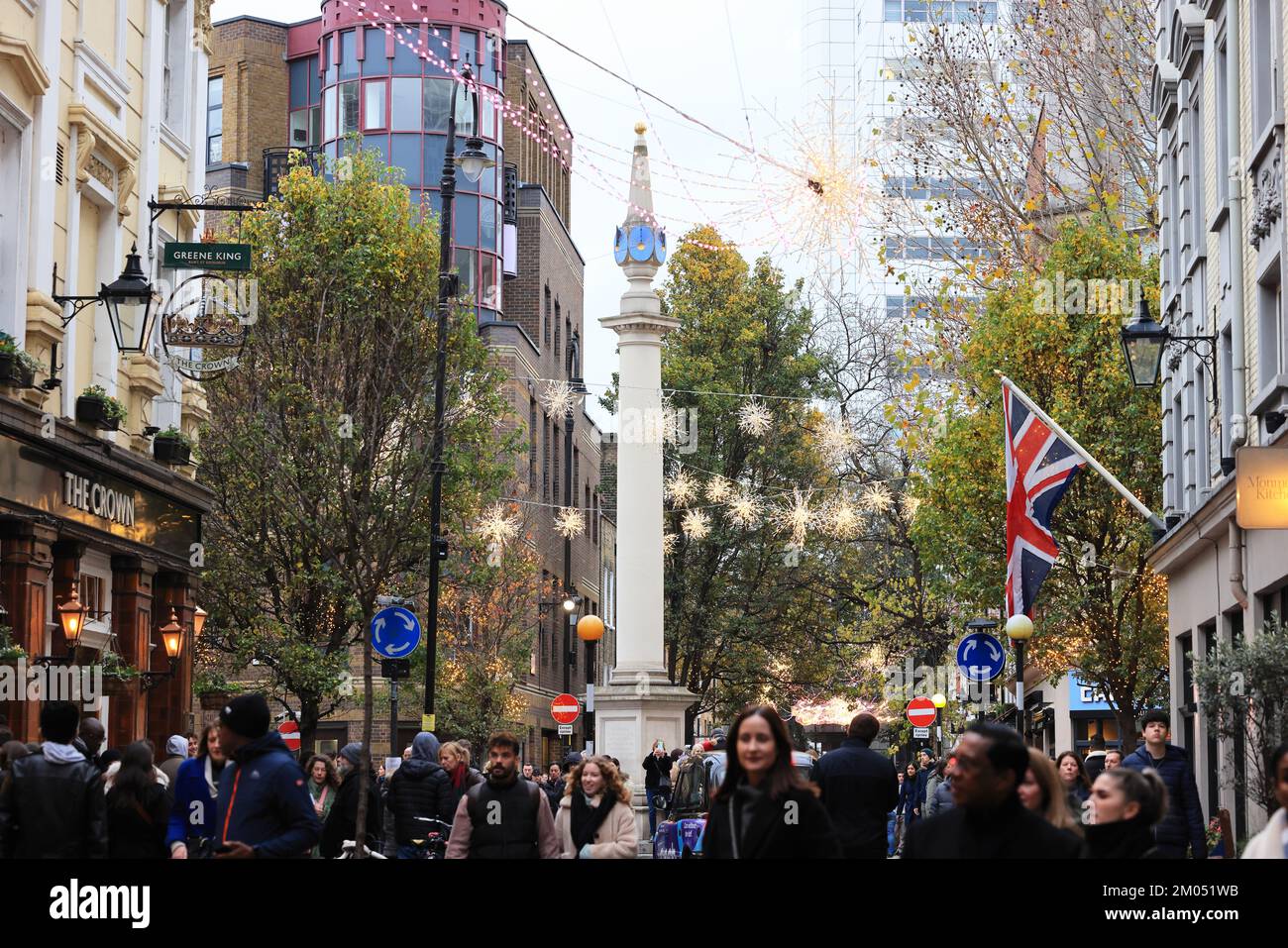 Seven Dials shopping district in Covent Garden, very busy in the Christmas season, 2022, despite the cost of living crisis, in central London, UK Stock Photo