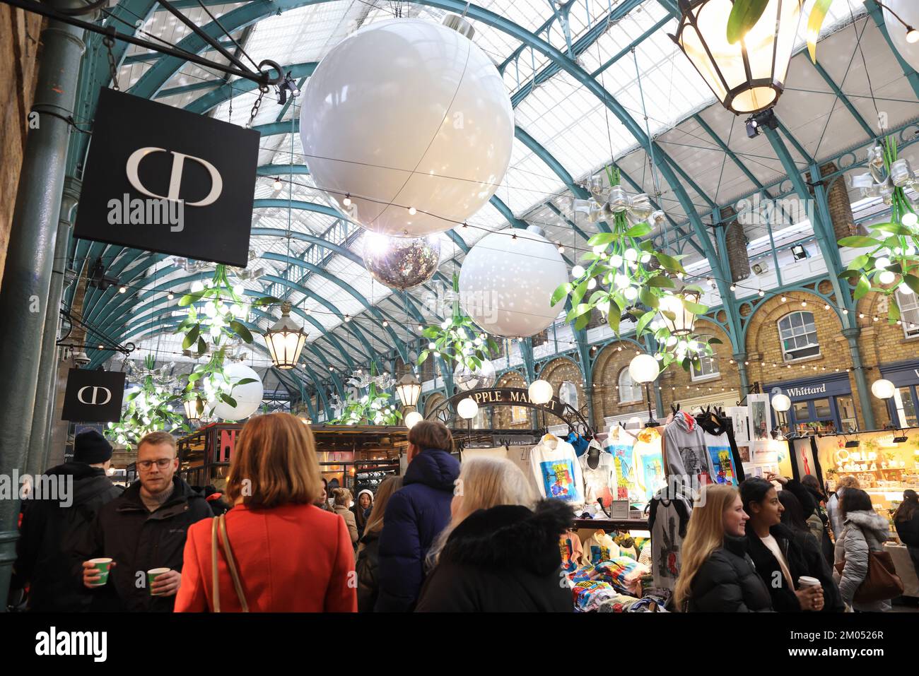 The Apple Market in Covent Garden, very busy in the Christmas season, 2022, despite the cost of living crisis, in central London, UK Stock Photo