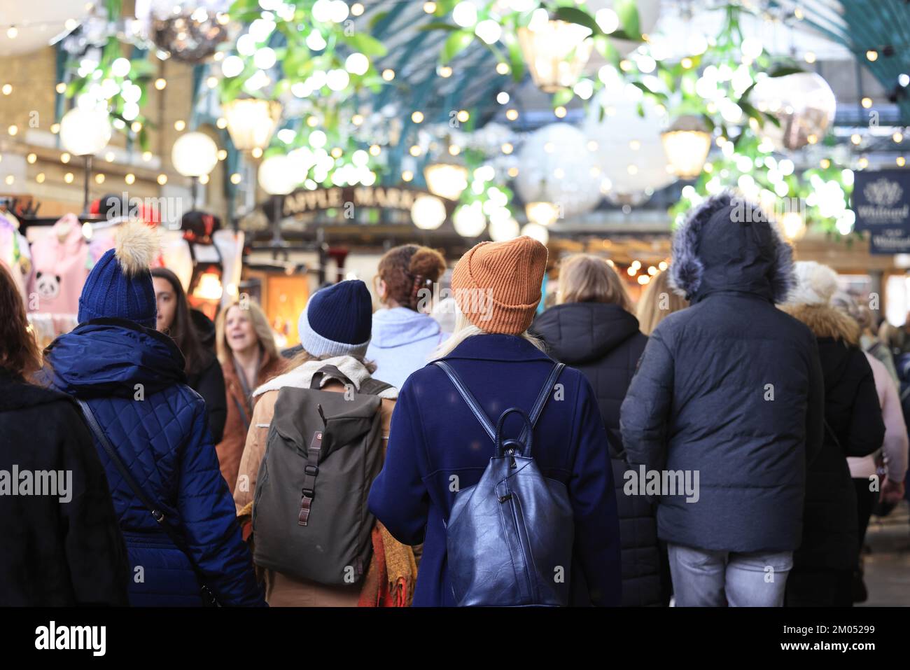 The Apple Market in Covent Garden, very busy in the Christmas season, 2022, despite the cost of living crisis, in central London, UK Stock Photo