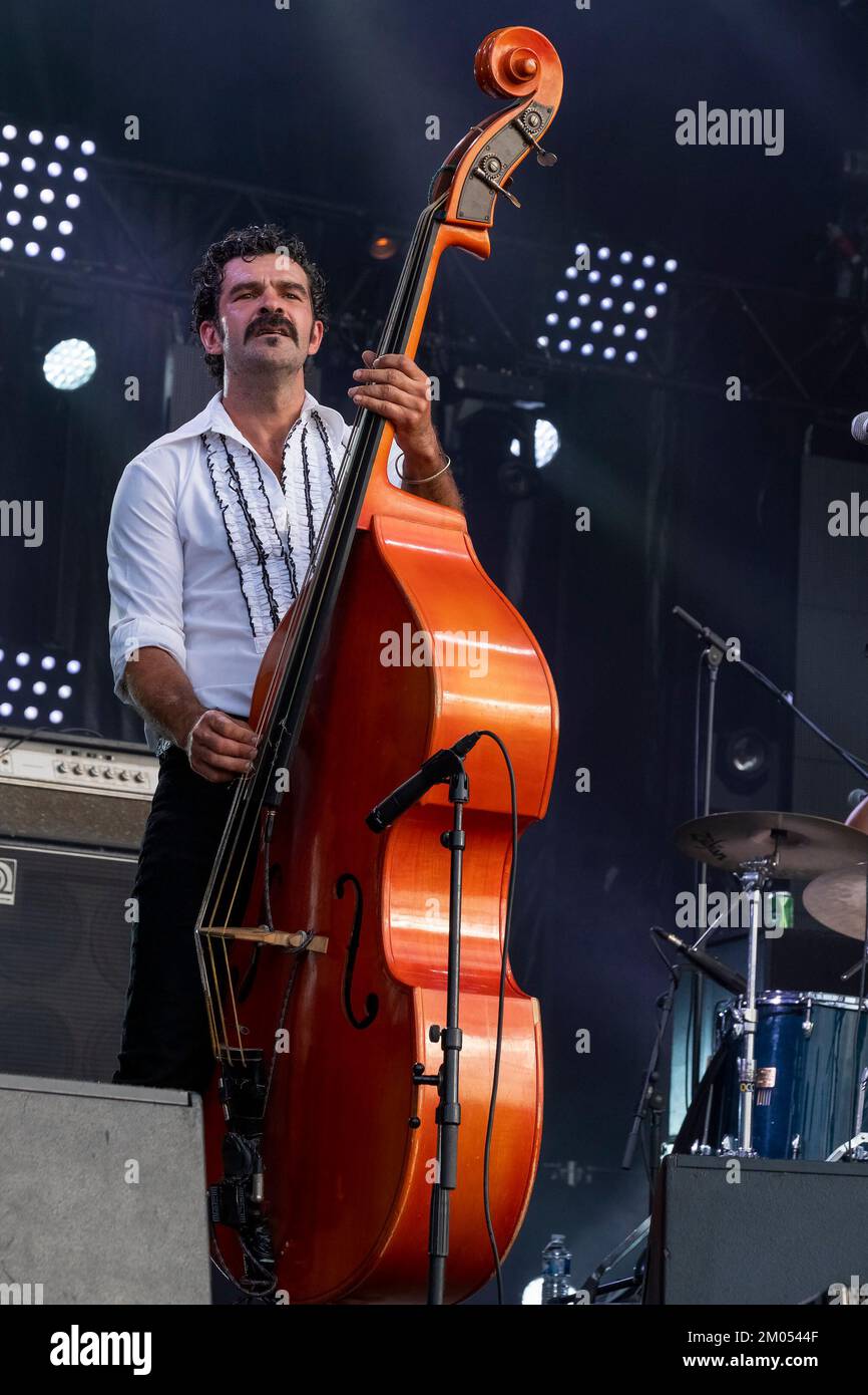 Singer and double bass player of the rockabilly band Johnny Montreuil on stage Stock Photo
