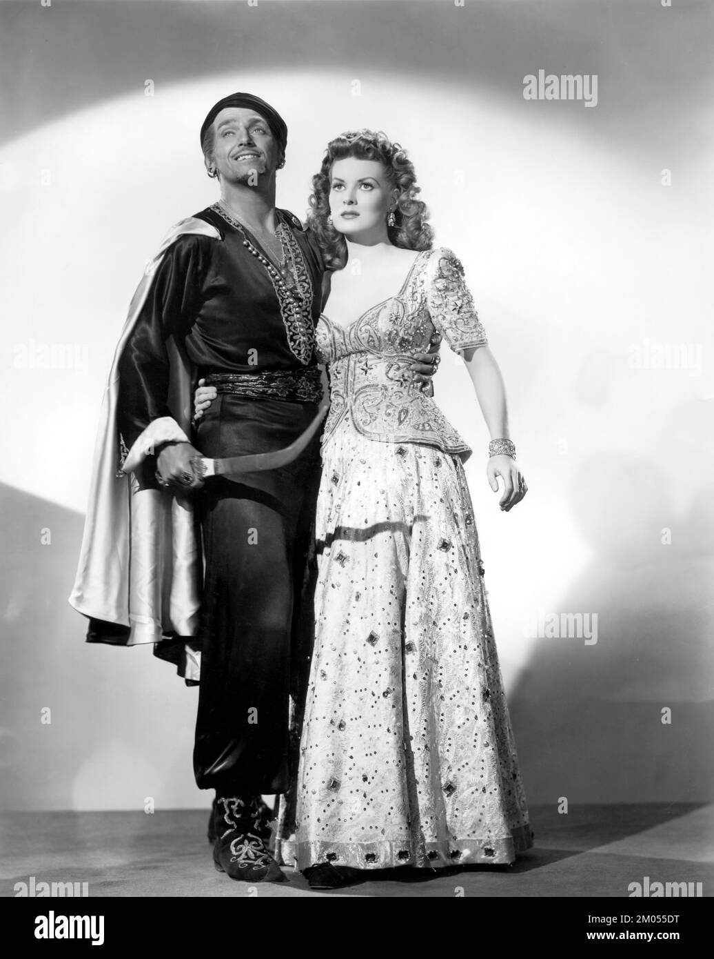 MAUREEN O'HARA and DOUGLAS FAIRBANKS JR. in SINBAD, THE SAILOR (1947), directed by RICHARD WALLACE. Credit: RKO / Album Stock Photo