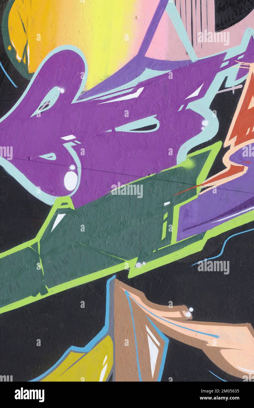 Colorful background of graffiti painting artwork with bright aerosol