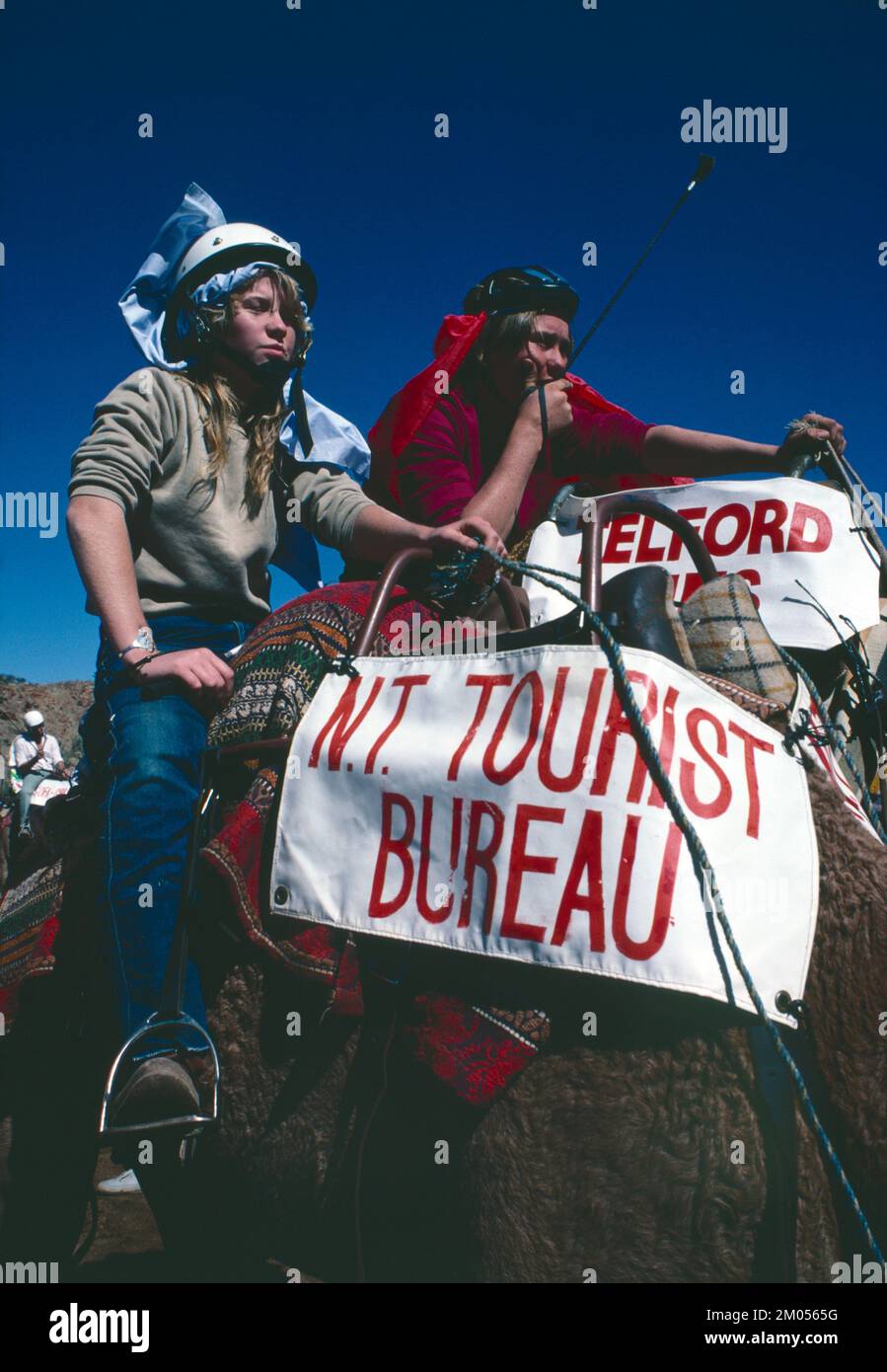 Australia. Northern Territory. Alice Springs. Camel Cup Races. Close up of two riders. Stock Photo