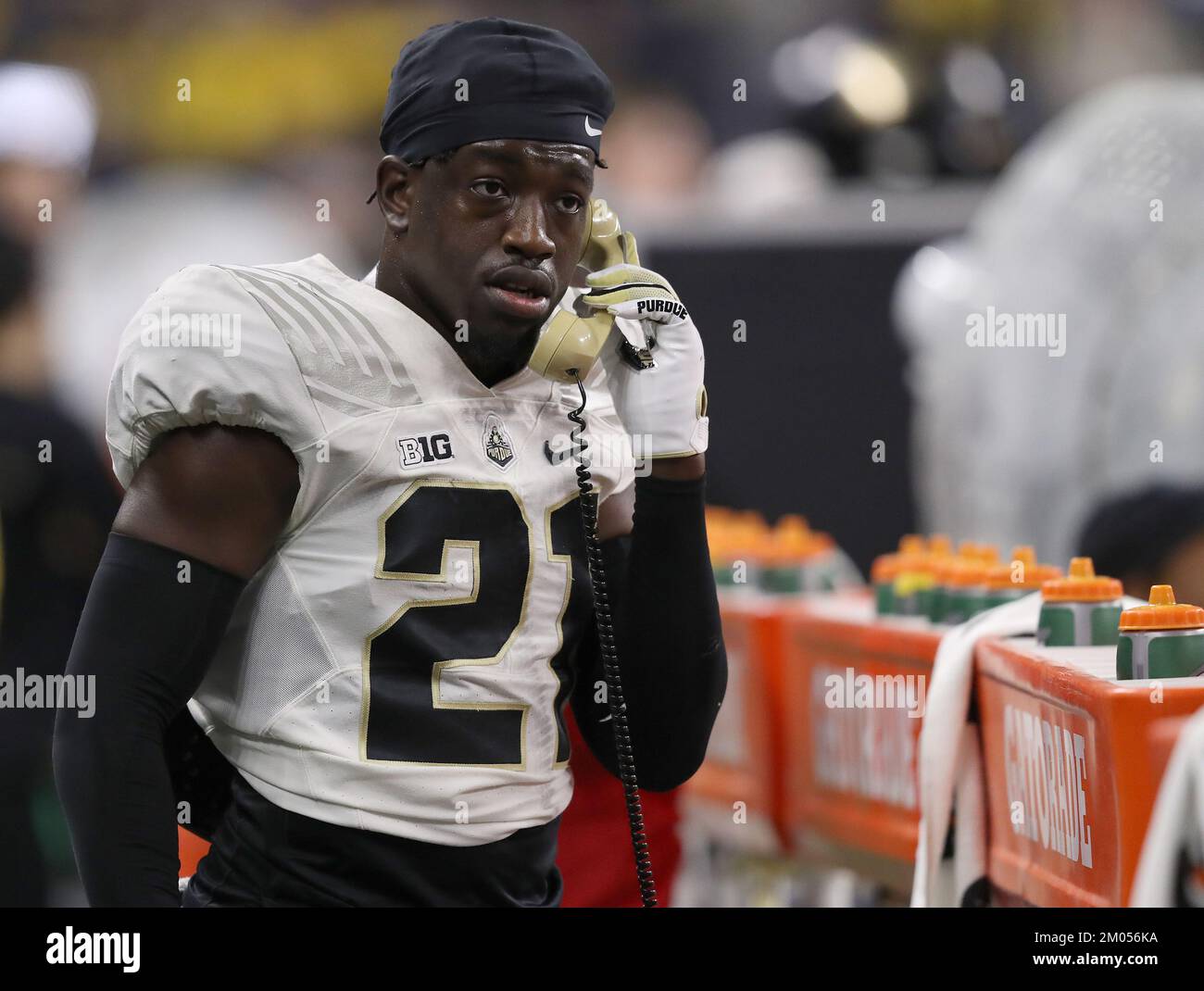 Indianapolis, United States. 03rd Dec, 2022. Purdue Boilermakers Sanoussi Kane (21) talks on the phone during the fourth quarter against the Michigan Wolverines at the Big Ten Championship game in Indianapolis, Indiana on Saturday, December 3, 2022. Photo by Aaron Josefczyk/UPI Credit: UPI/Alamy Live News Stock Photo