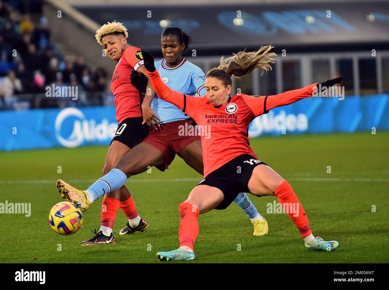Manchester City's Khadija Shaw battles for the ball with Brighton and Hove Albion's Victoria Williams and Kayleigh Green during the Barclay Women's Super League match at the Manchester City Academy Stadium, Manchester. Picture date: Sunday December 4, 2022. Stock Photo