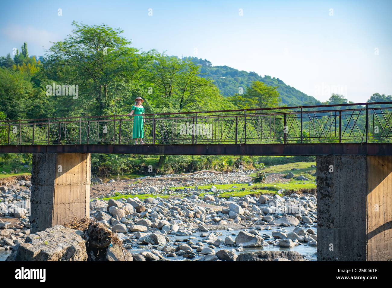 Girl standing on suspension hi-res stock photography and images - Alamy