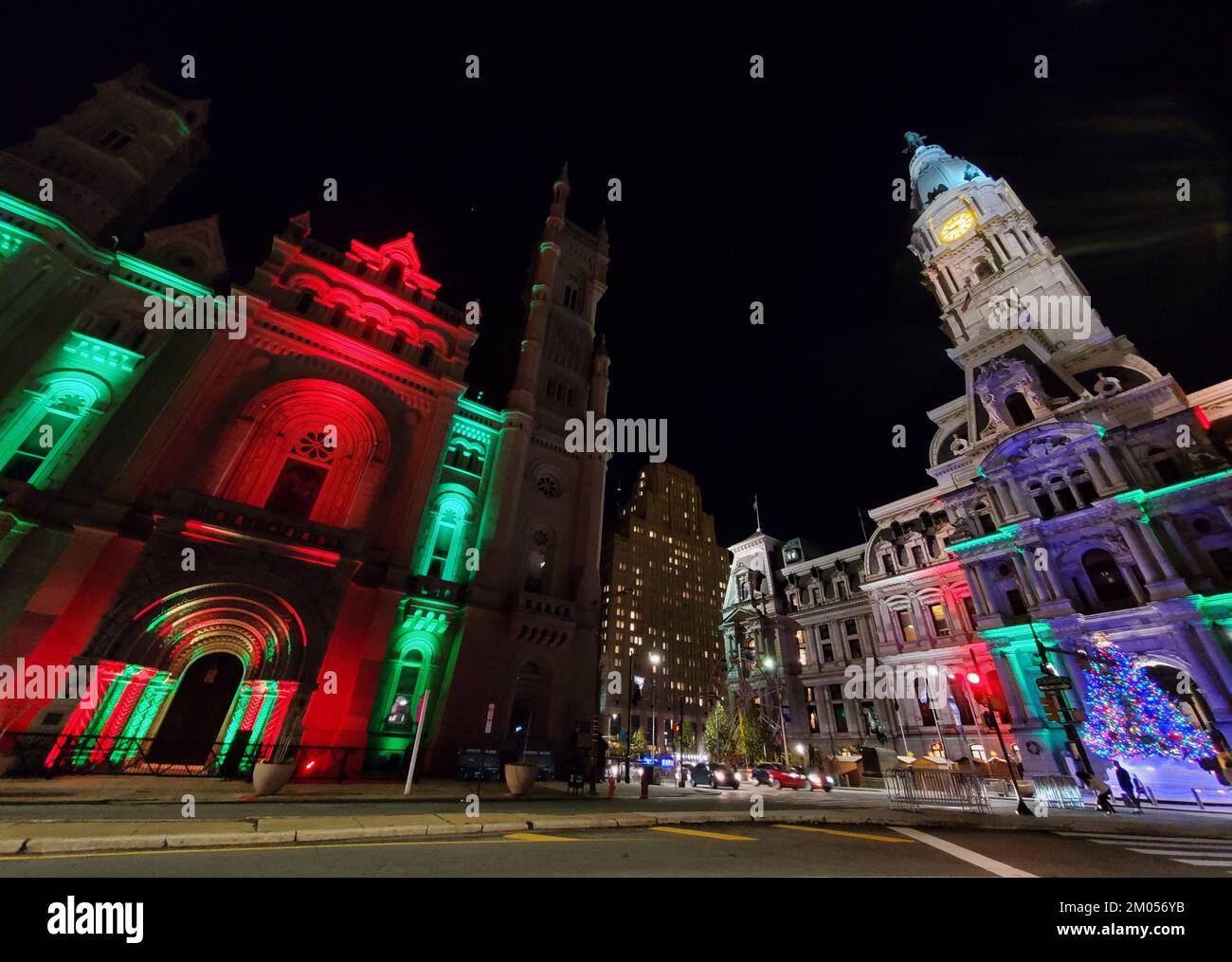 Philadelphia, U.S - December 3, 2022 -Green and red lights decoration on Grand Lodge of Pennsylvania and the City Hall Stock Photo