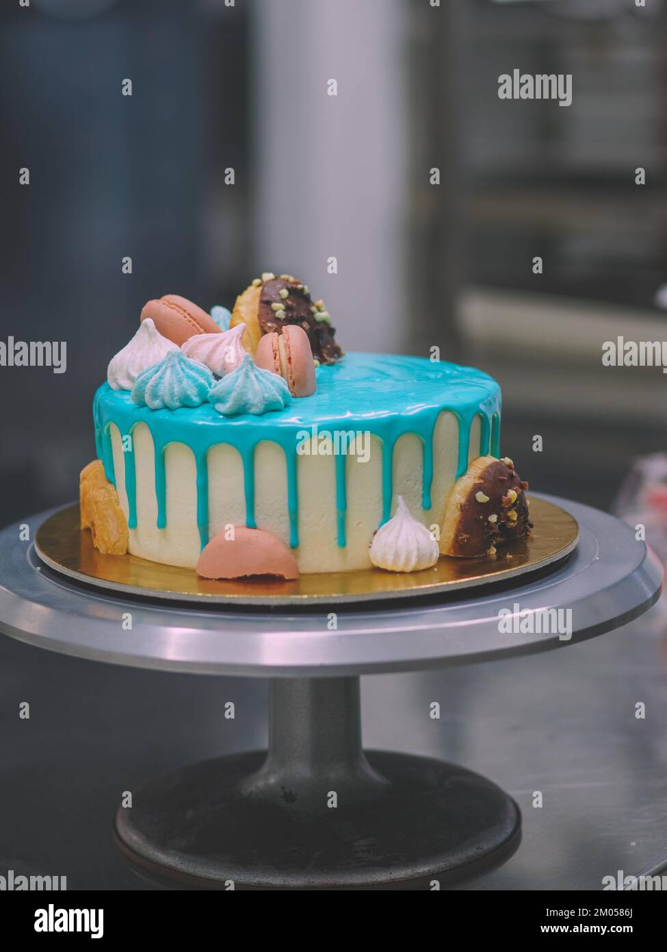 donuts meringue berries and sparkles topping on frosted icing drip