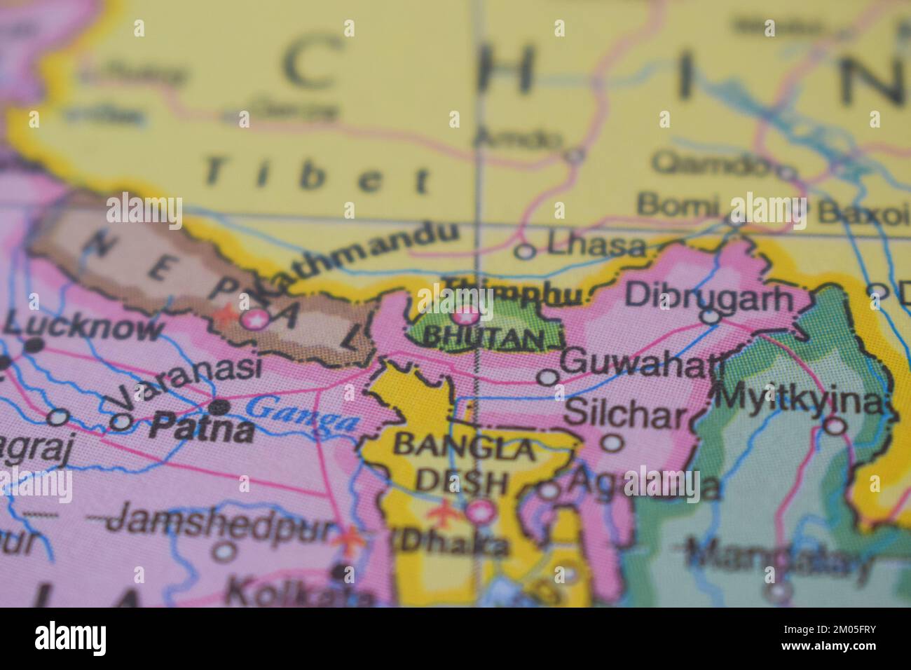 Bhutan Country Name On The Political World Map Very Macro Close Up View Bhutan Country Name On The Political World Map Very Macro Close Up View 2M05FRY
