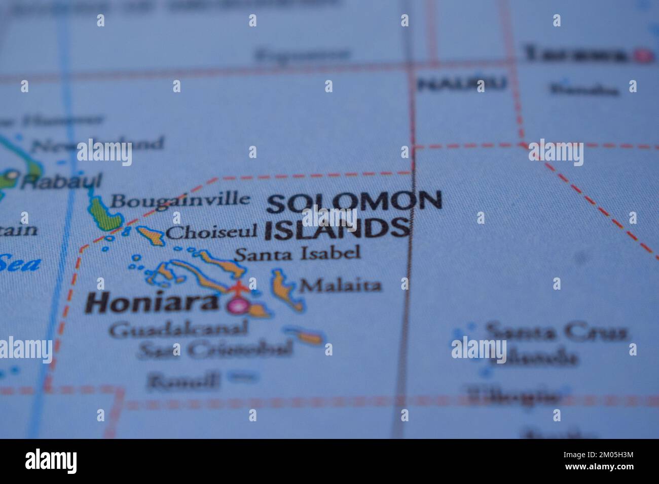 Solomon Island Country Name On The Political World Map Very Macro Close-Up View Stock Photo