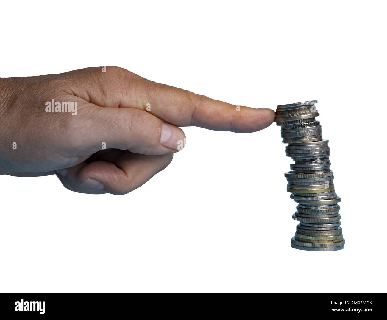 one finger holds the hovering stack of coins. In concept of protection from the loss of currency value as a result of inflation Stock Photo