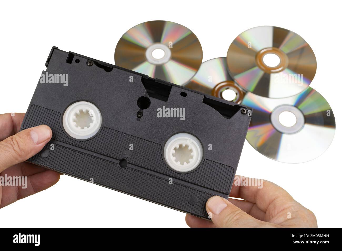 An old VHS videotape and some CDs Stock Photo