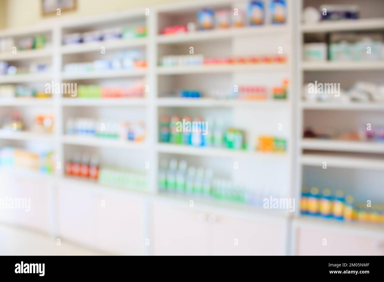 pharmacy shelves filled with medication blur background Stock Photo - Alamy