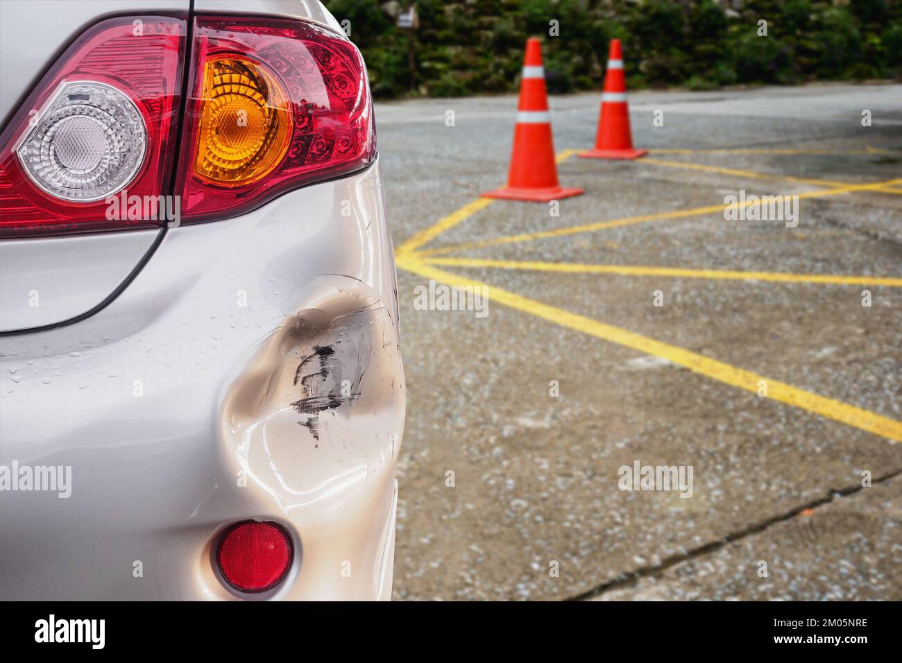 car has dented rear bumper damaged after accident Stock Photo Alamy