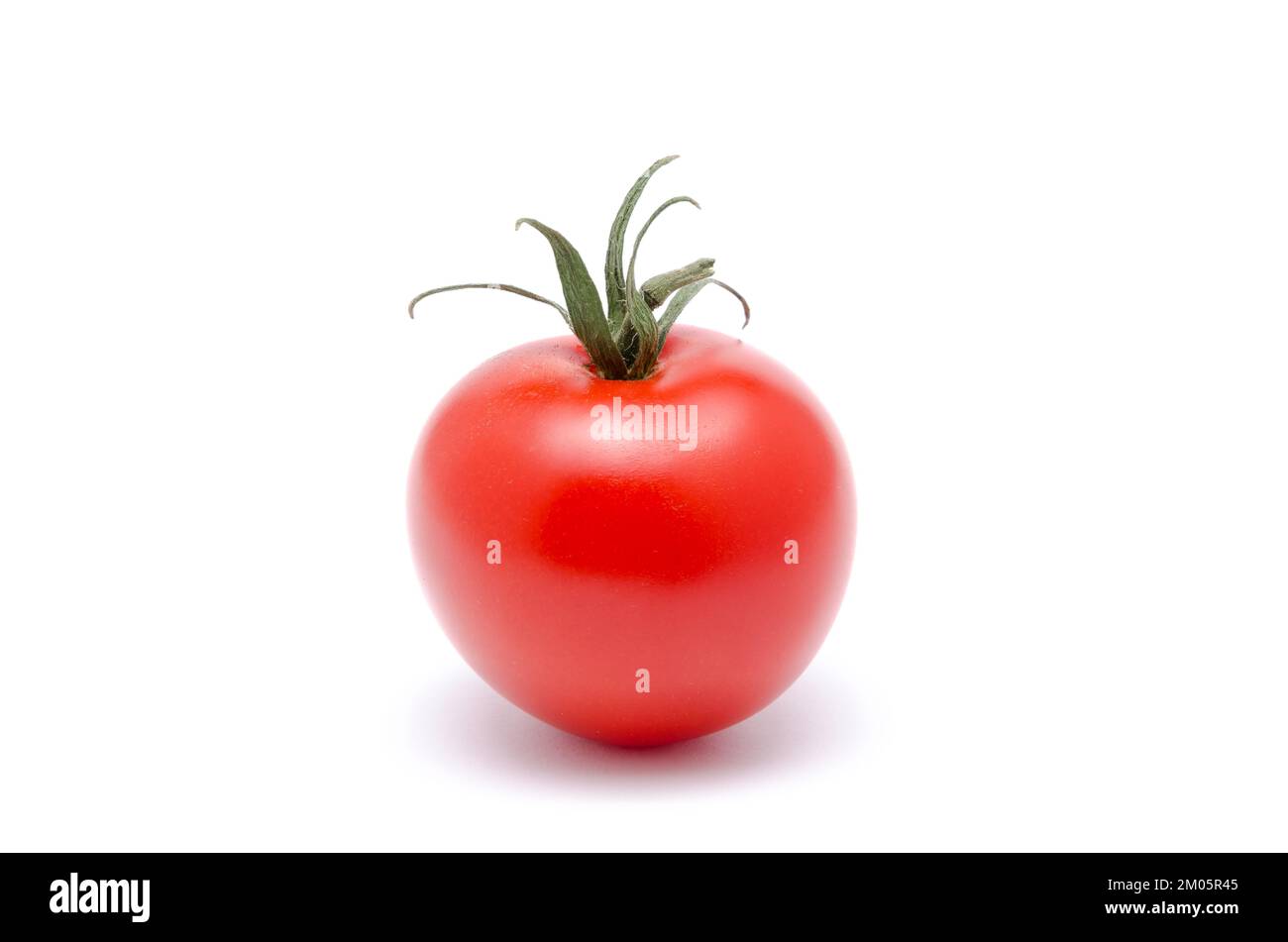 Red ripe tomato, Solanum lycopersicum, isolated on white background Stock Photo