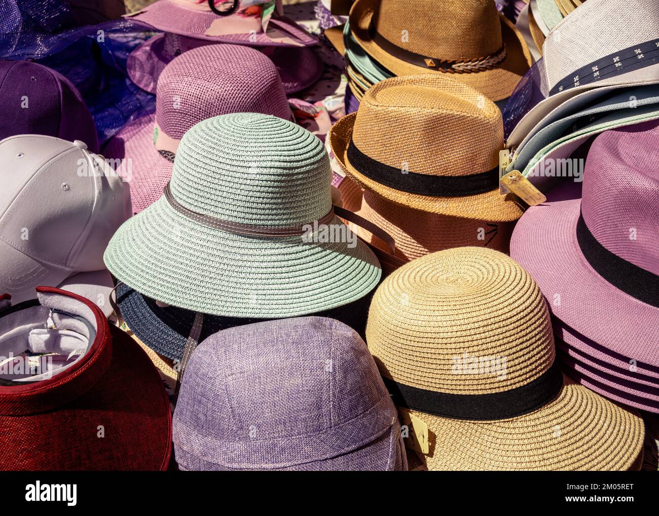 Straw sun hats on a street market at Brihuega July Lavander festival Stock Photo