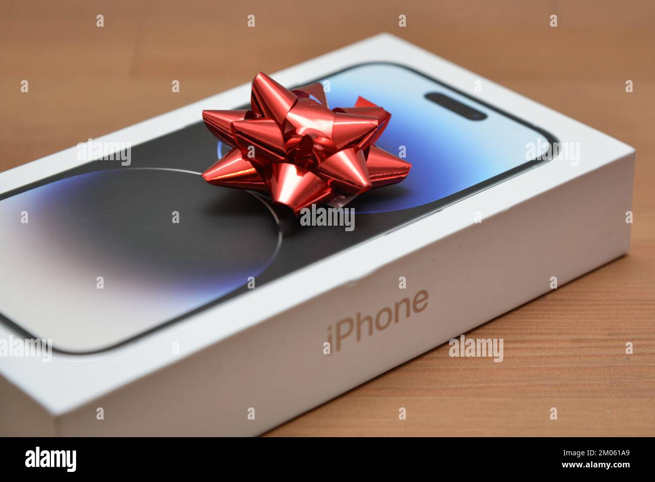 Riga, Latvia - December 4, 2022: Apple iPhone 14 pro smartphone Christmas gift Stock Photo
