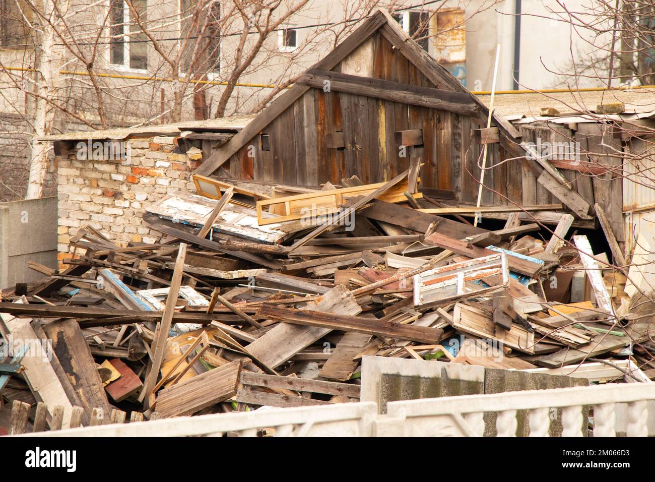 old ruined house covered with boards in Ukraine Stock Photo