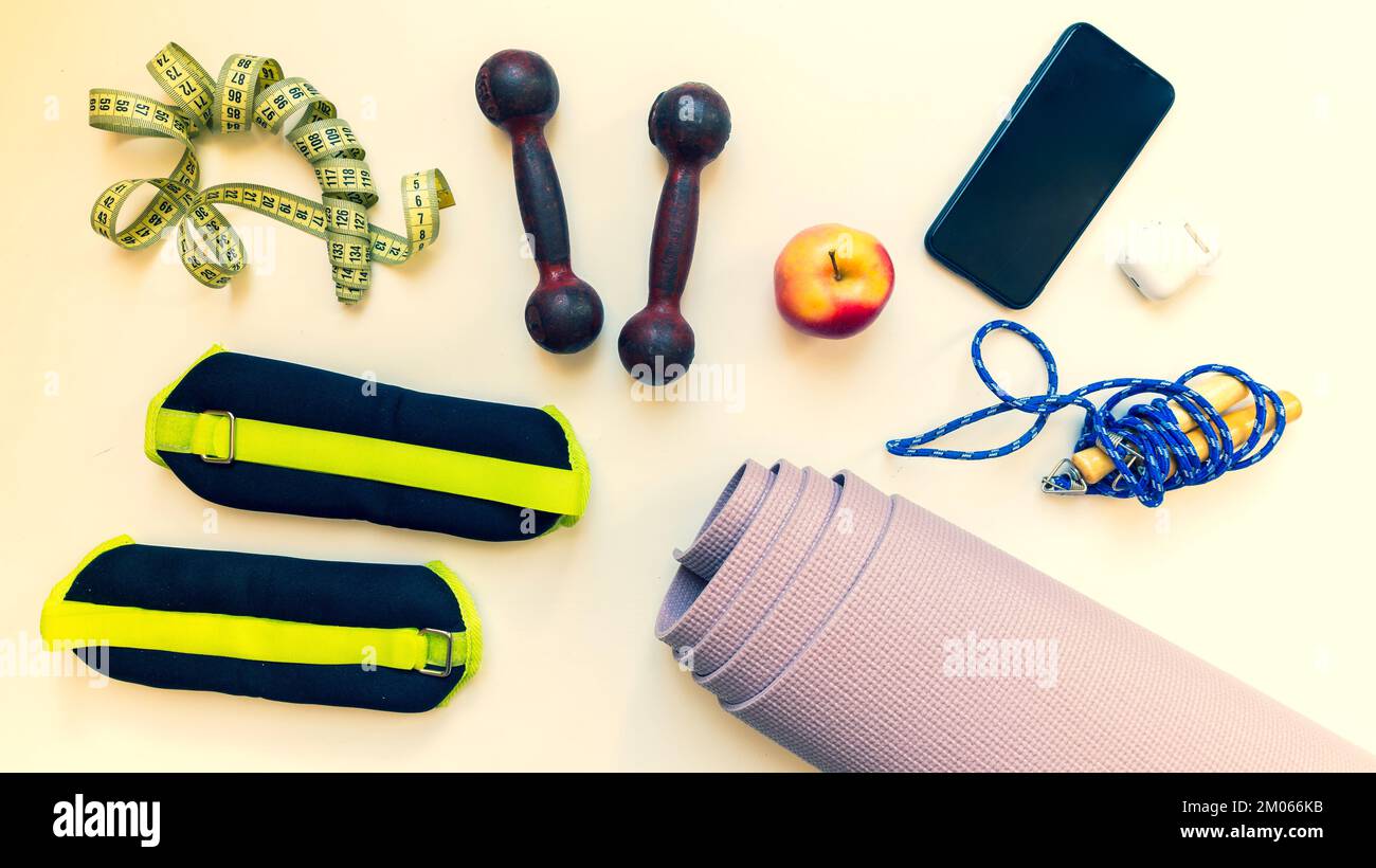 Top view Healthy female flat lay runners sports set up and fitness