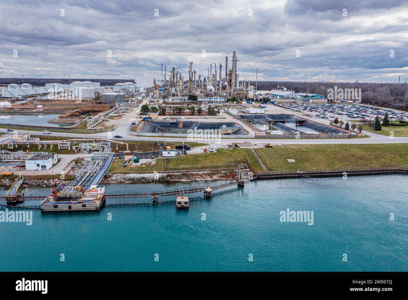Suncor Sarnia Refinery produces petrol gasoline, kerosene, jet, and diesel fuels in Canada along the freshwater St. Clair River / US Border. Stock Photo