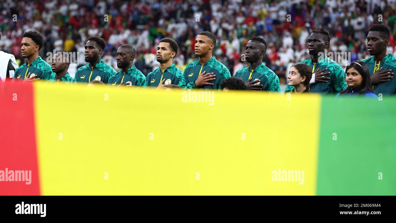 Al Khor, Qatar. 4th Dec, 2022. Senegal line up to sing their Anthem during the FIFA World Cup 2022 match at Al Bayt Stadium, Al Khor. Picture credit should read: David Klein/Sportimage Credit: Sportimage/Alamy Live News Stock Photo