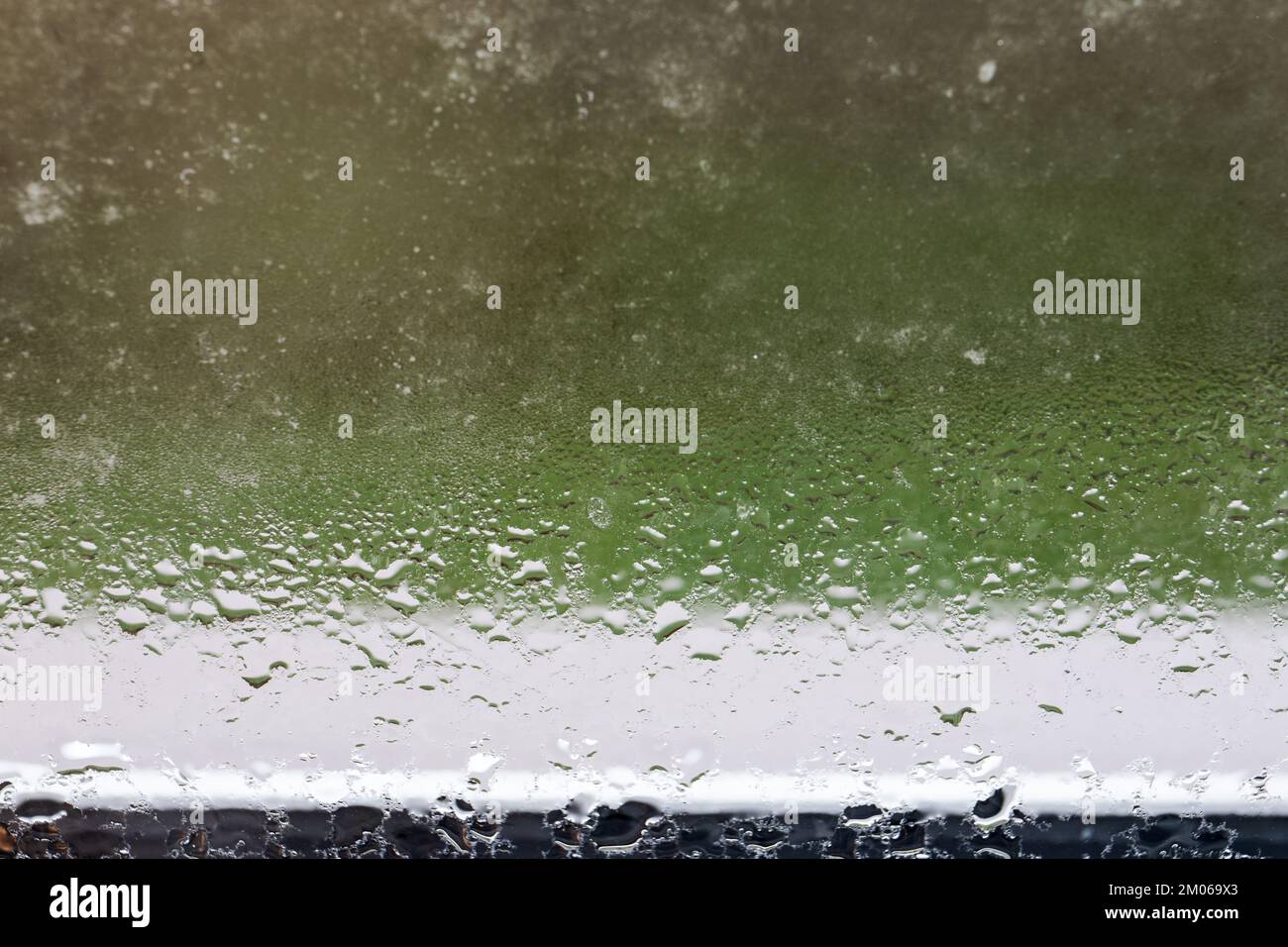 House Window With Condensation. Energy efficiency and heat Stock Photo