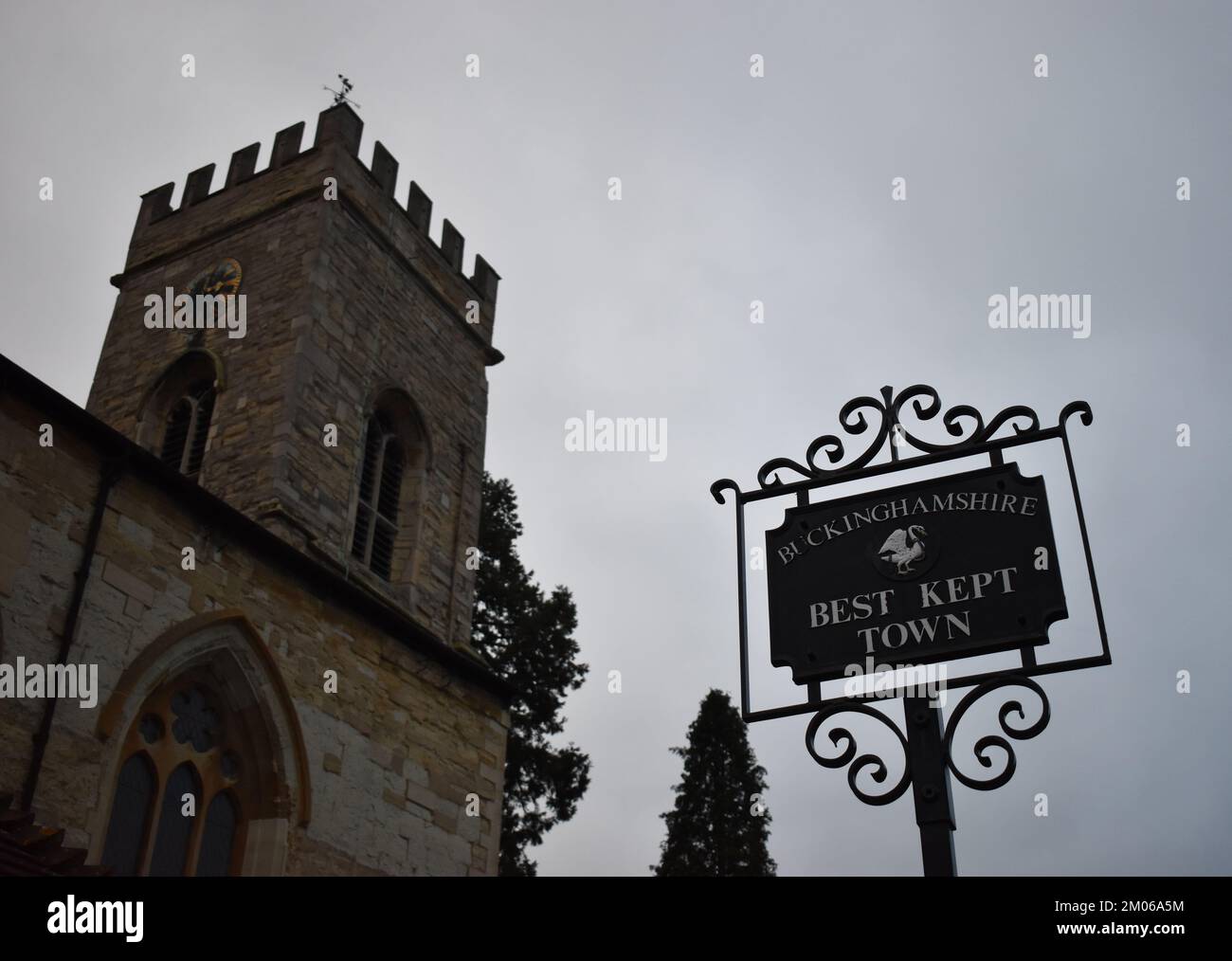 "Best Kept Town" sign in Stony Stratford, Milton Keynes with the church