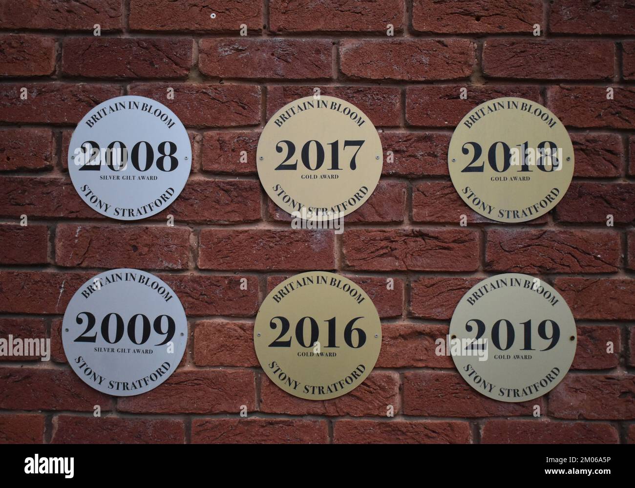Plaques for the Britain in Bloom awards for the town of Stony Stratford. The Britain in Bloom competition is held by the Royal Horticultural Society. Stock Photo