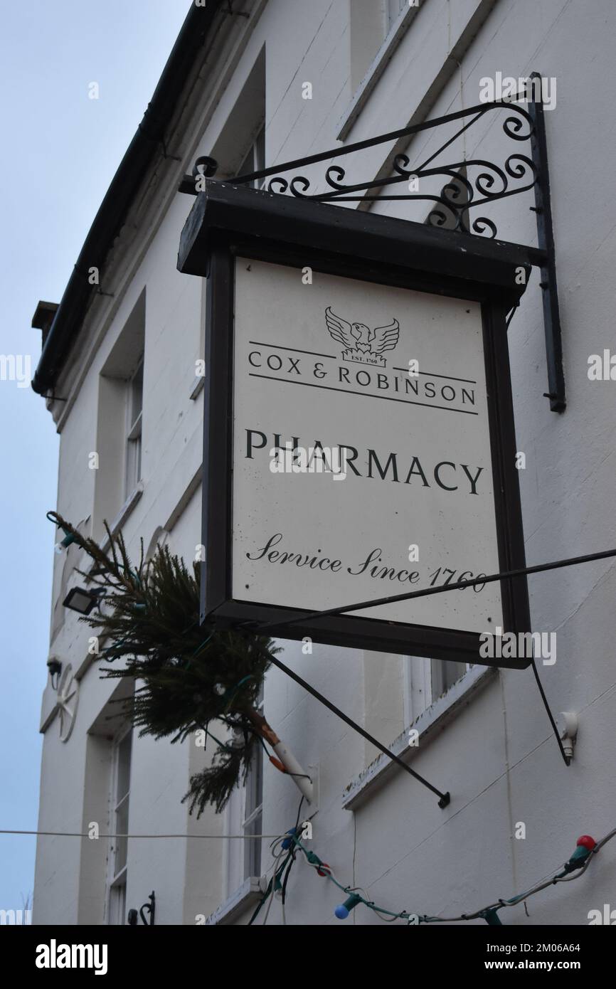 Pharmacy sign at Cox & Robinson on Market Square in Stony Stratford. Stock Photo