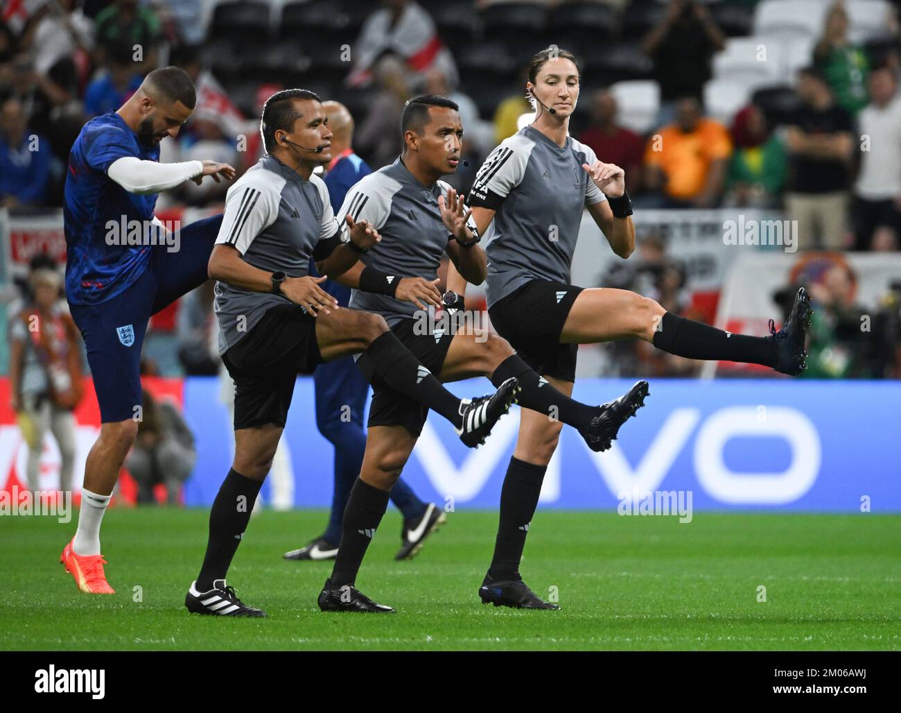 Al Khor, Qatar. 4th Dec, 2022. Assistant referee Kathryn Nesbitt (R ...