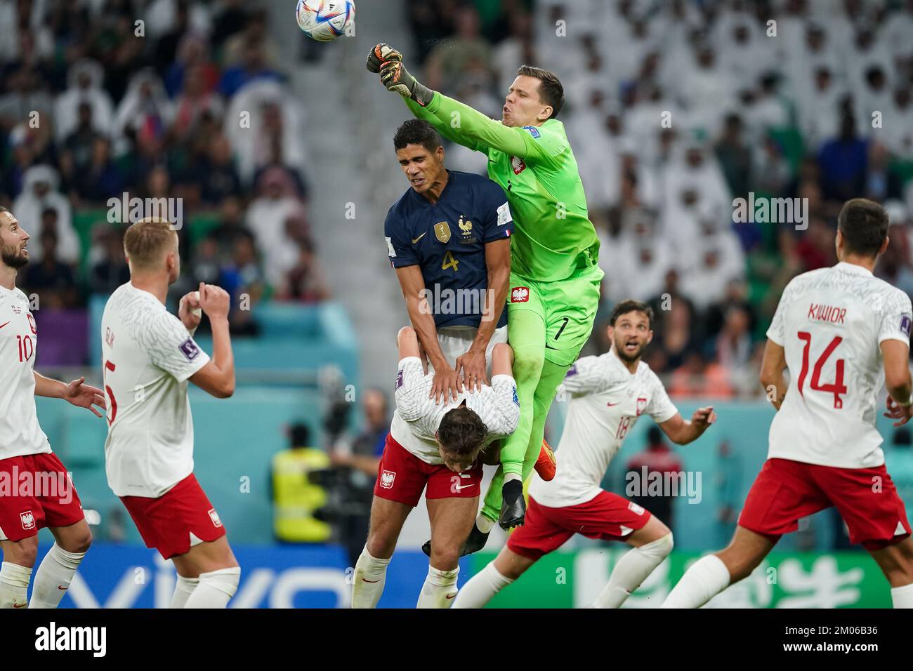 DOHA, QATAR - DECEMBER 4: Player of France  Hugo Lloris saves the ball whilst under pressure during the FIFA World Cup Qatar 2022 Round of 16 match between France and Poland at Al Thumama Stadium on December 4, 2022 in Doha, Qatar. (Photo by Florencia Tan Jun/PxImages) Stock Photo