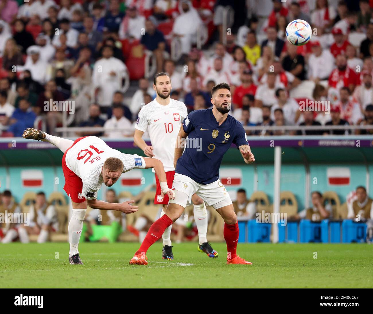 Olivier Giroud of France, Kamil Glik of Poland (left) during the FIFA World Cup 2022, Round of 16 football match between France and Poland on December 4, 2022 at Al Thumama Stadium in Doha, Qatar - Photo Jean Catuffe / DPPI Stock Photo