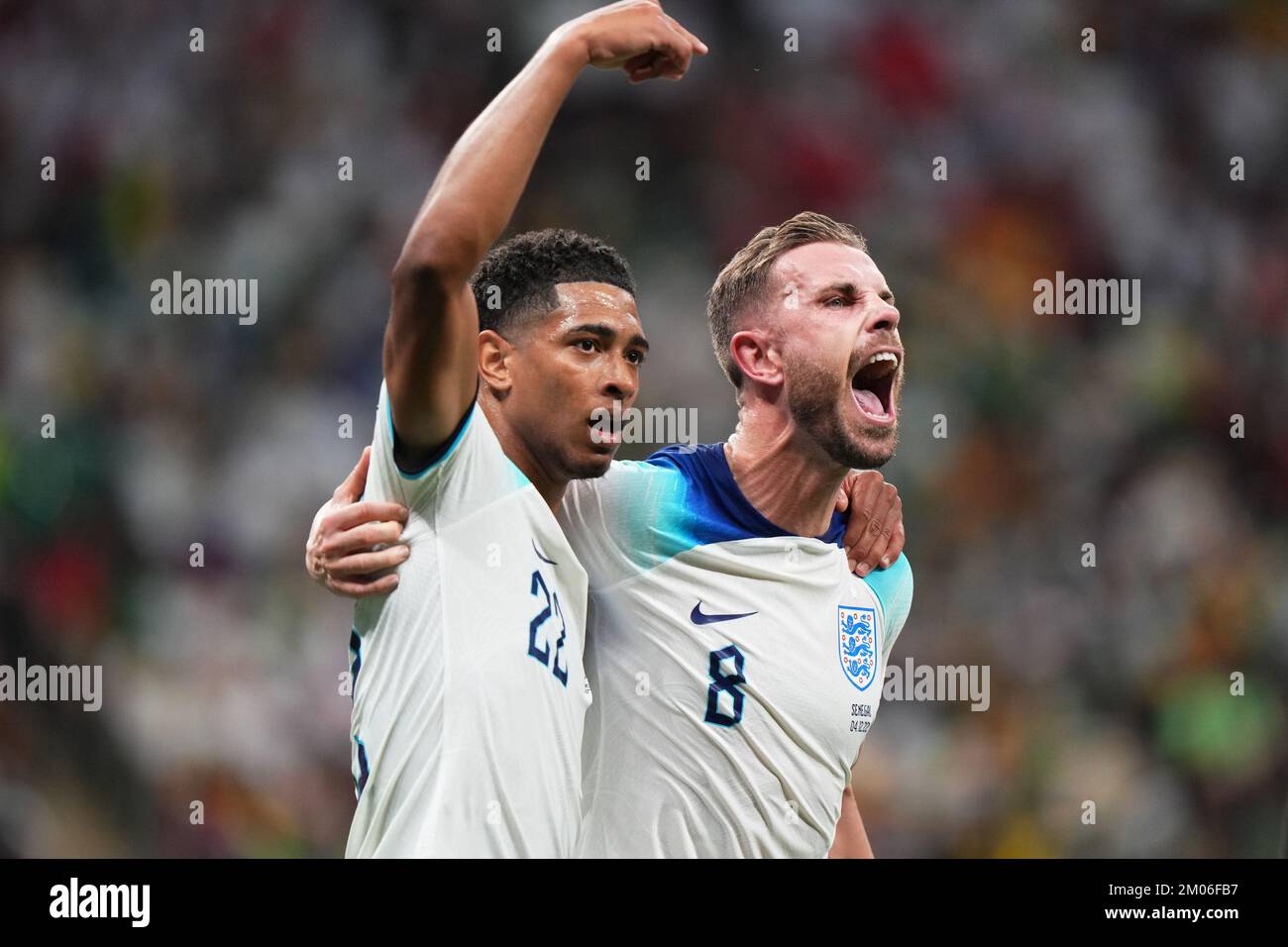 Al Khor, Qatar. 04th Dec, 2022. Jordan Henderson of England celebrates his goal with Jude Bellingham during the FIFA World Cup Qatar 2022 match, round of 16, between England and Senegal played at Al Bayt Stadium on Dec 4, 2022 in Al Khor, Qatar. (Photo by Bagu Blanco/PRESSIN) Credit: PRESSINPHOTO SPORTS AGENCY/Alamy Live News Stock Photo