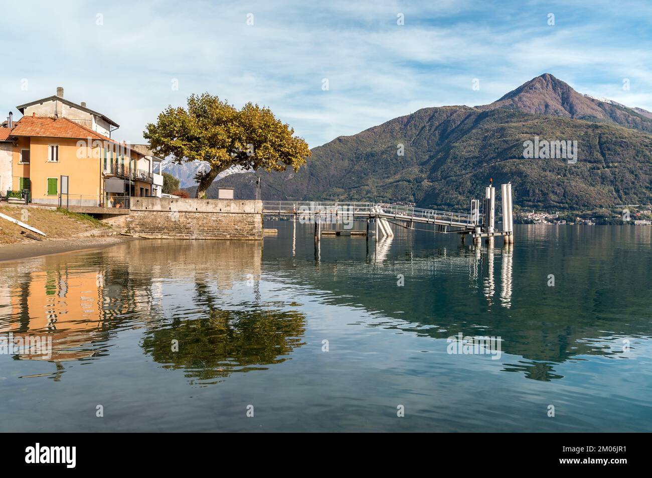 Landscape of Lake Como with the pier of the Cremia village at autumn time, Lombardy, Italy Stock Photo