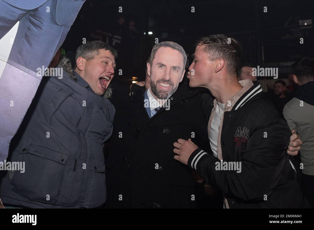 The Mill, Digbeth, Birmingham, December 4th 2022 - England fans celebrate at the 4TheFans Fan Park in Birmingham after England win against Senegal in the 2022 FIFA World Cup. Credit: Stop Press Media/Alamy Live News Stock Photo