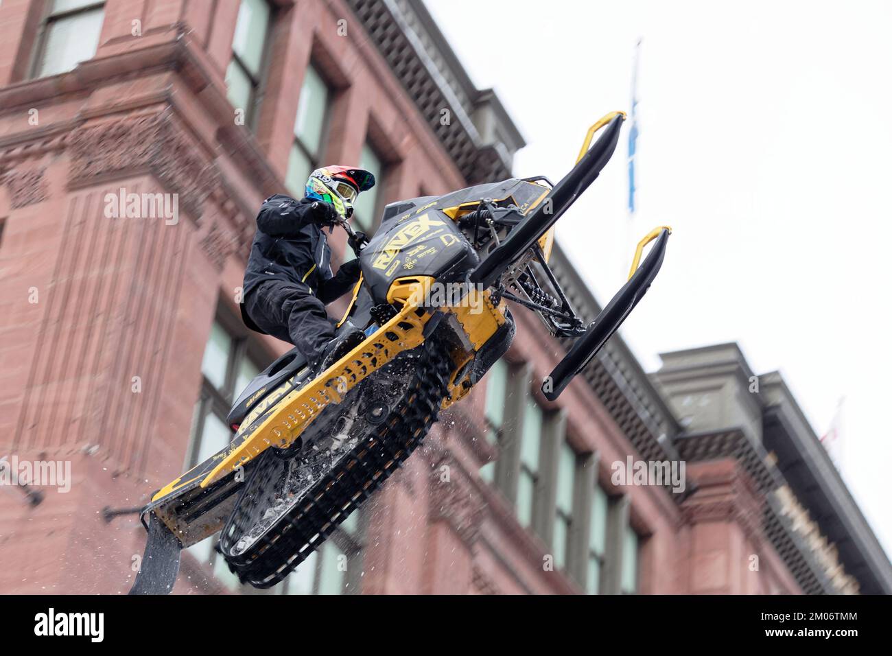 World snowmobiling champions perform aerial tricks in downtown Montreal. Quebec,Canada Stock