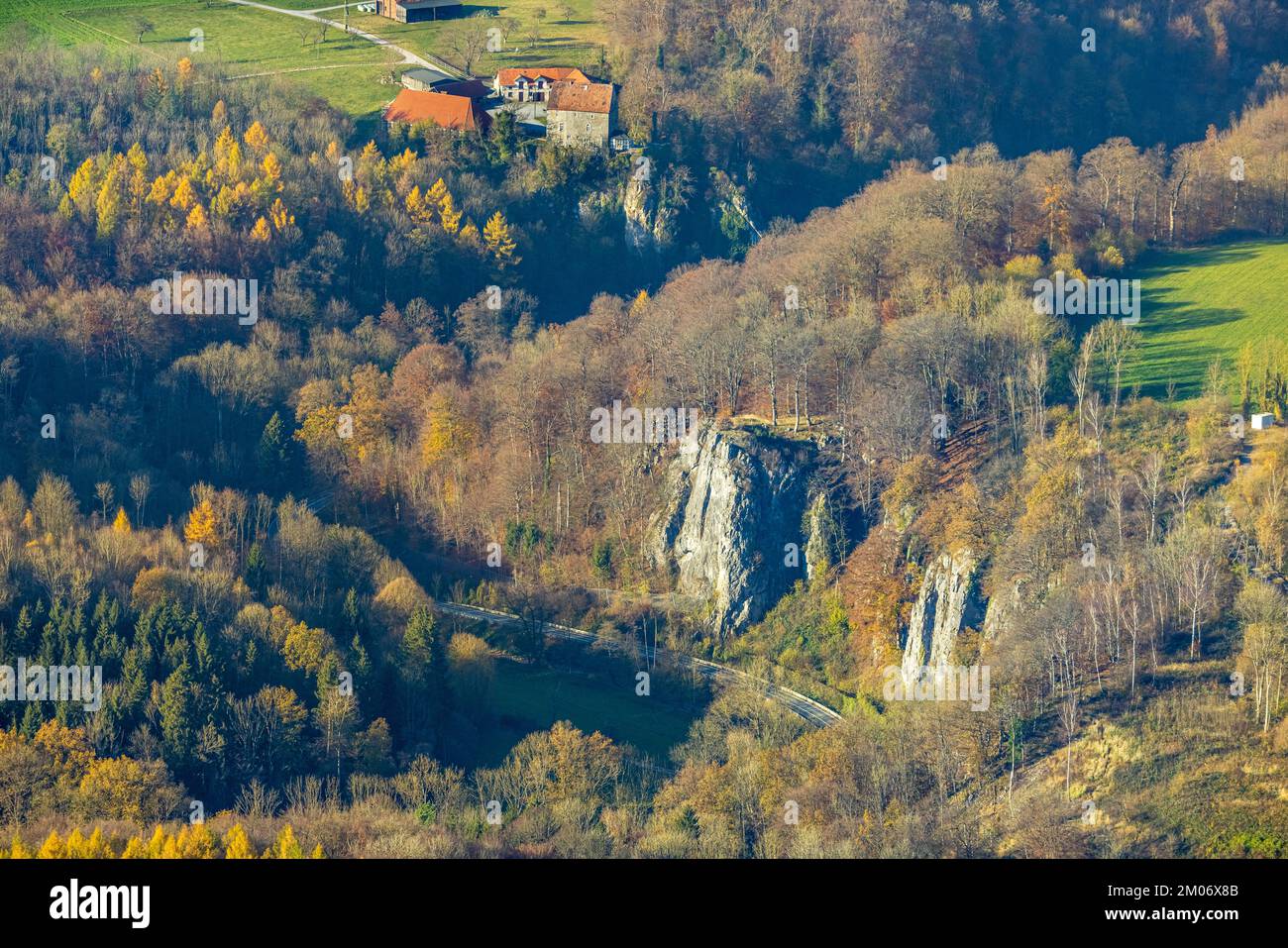 Aerial view, Reckenhöhle dripstone cave in autumnal forest in Volkringhausen district in Balve, Sauerland, North Rhine-Westphalia, Germany, Prize, DE, Stock Photo
