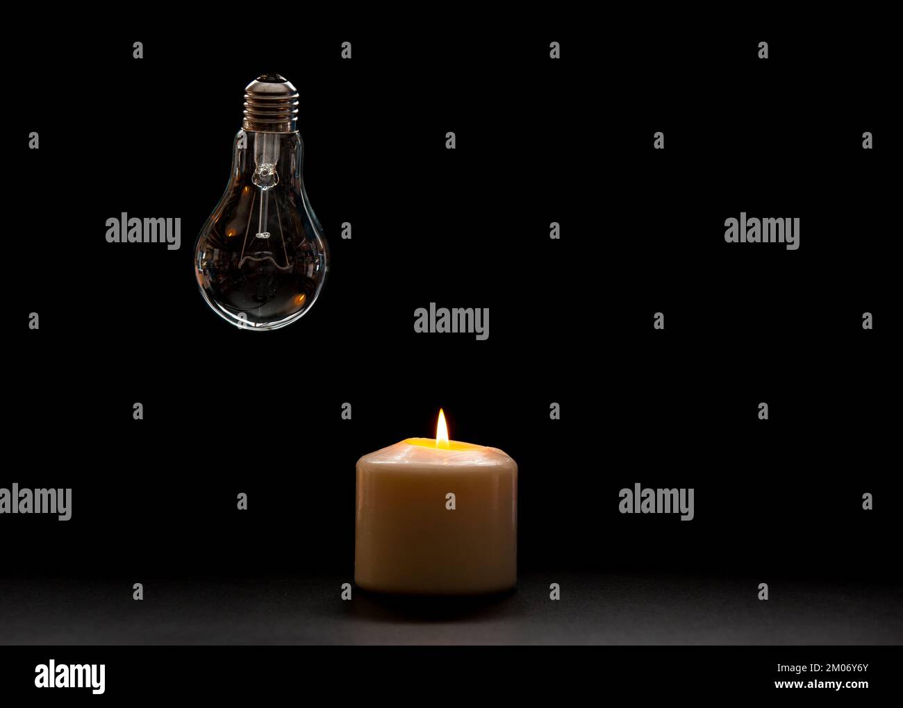 Traditional white household wax candles with brown paper packaging. Emergency  lighting electricity backup Stock Photo - Alamy