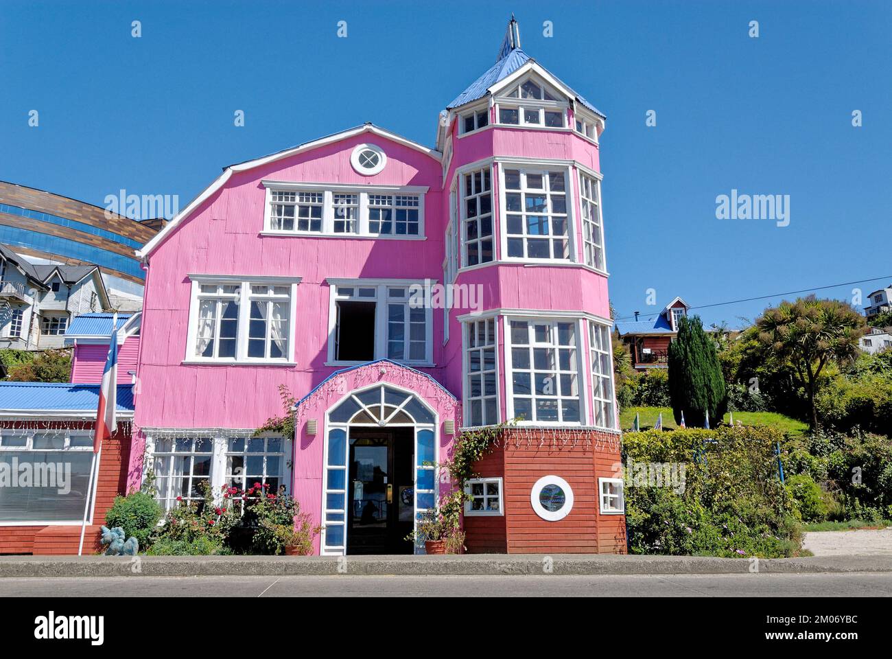 Pink Hotel Unicornio Azul - Historic hotel in Castro, Chile, Chiloe archipelago. Castro City, Chiloe Island, Chile. 16th of February 2014 Stock Photo