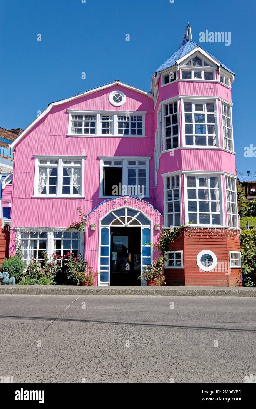 Pink Hotel Unicornio Azul - Historic hotel in Castro, Chile, Chiloe archipelago. Castro City, Chiloe Island, Chile. 16th of February 2014 Stock Photo