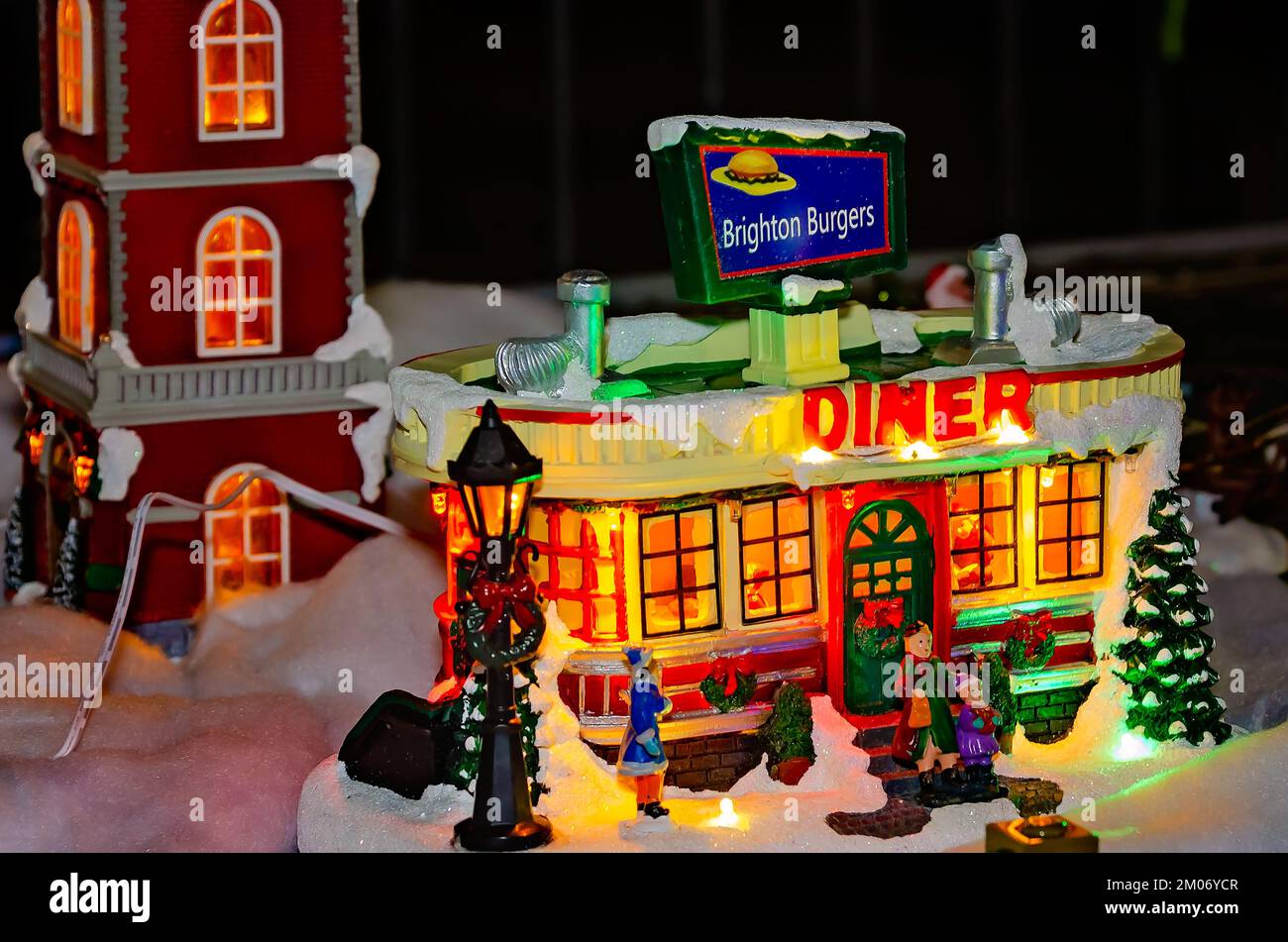 The Lowe’s Carole Towne 2022 Christmas village is displayed with a Christmas train set, Nov. 18, 2022, in Mobile, Alabama. Stock Photo