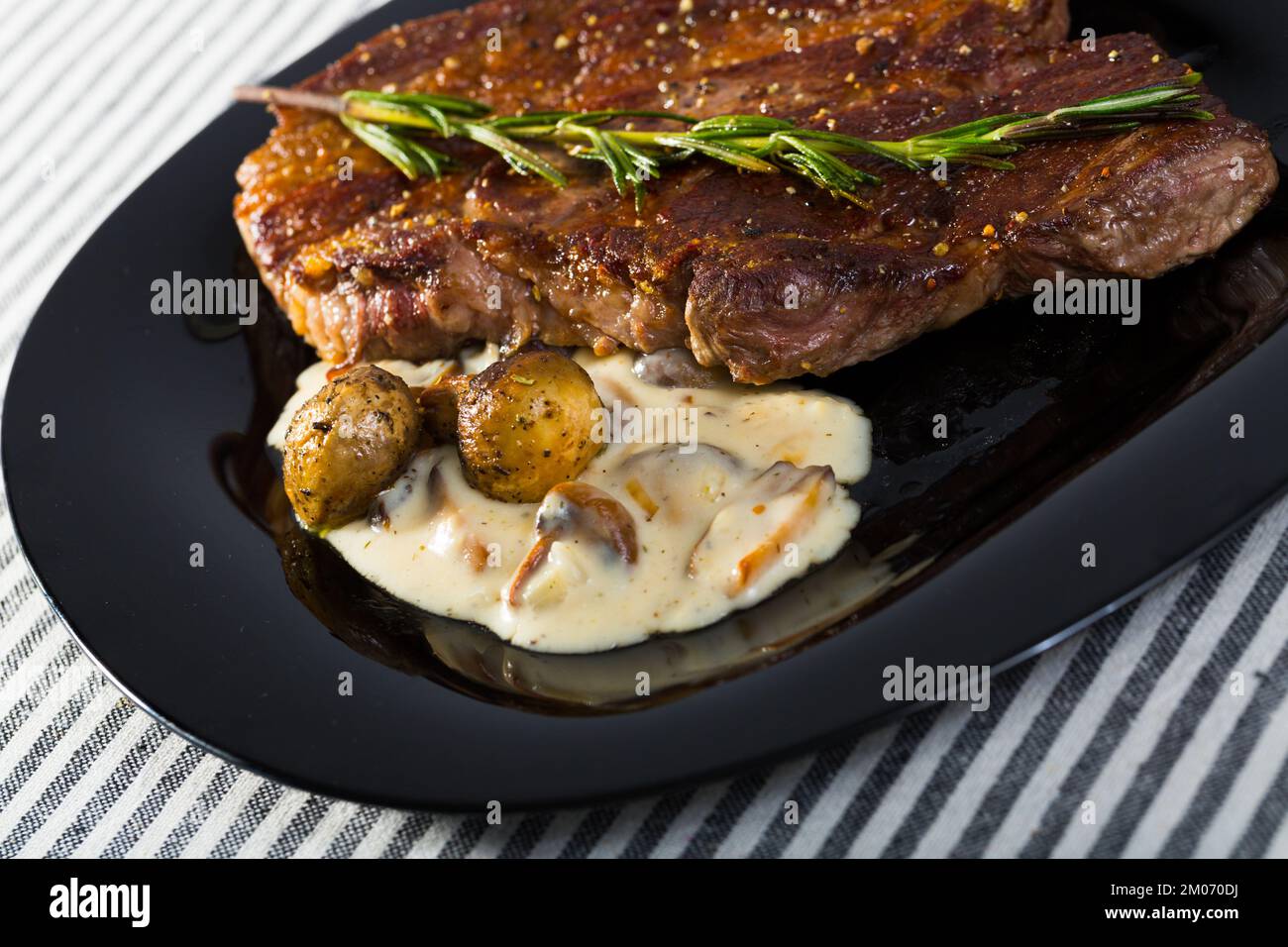 Roasted veal steak with mushroom sauce Stock Photo Alamy