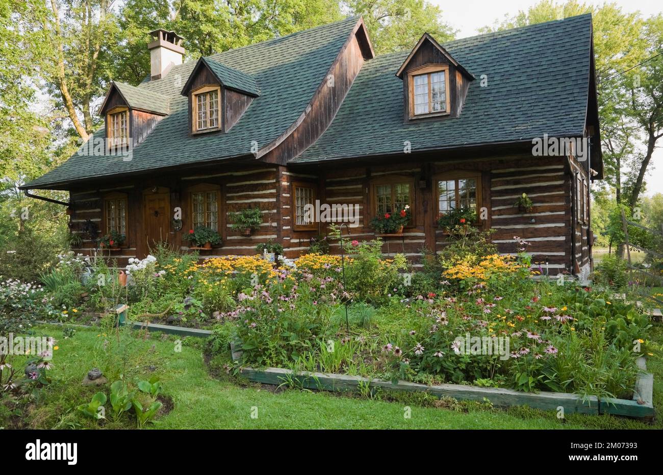 Old 1800s reconstructed Canadiana cottage style log home with