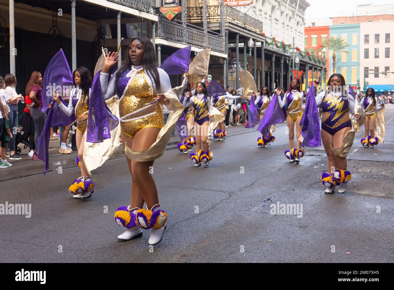 Female marching group in New Orleans' Christmas parade downtown Stock