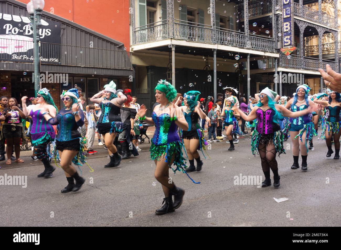 Female marching group in New Orleans' Christmas parade downtown Stock